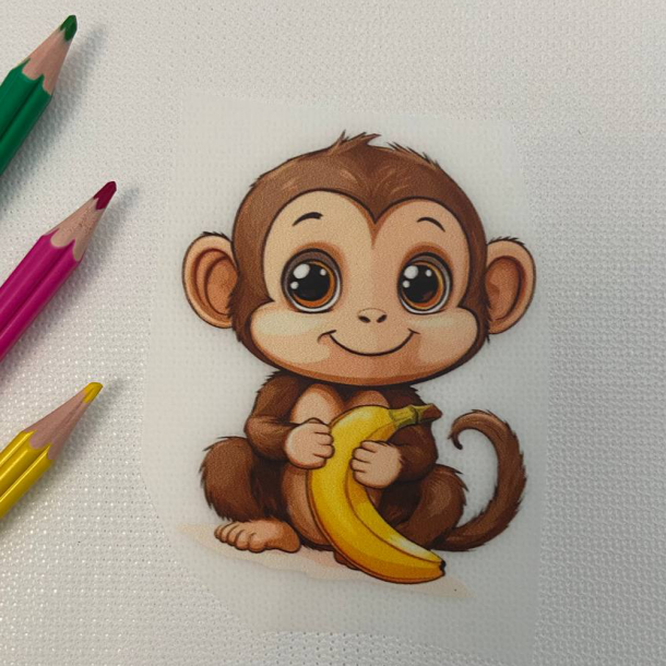 Миле мавпеня з бананом